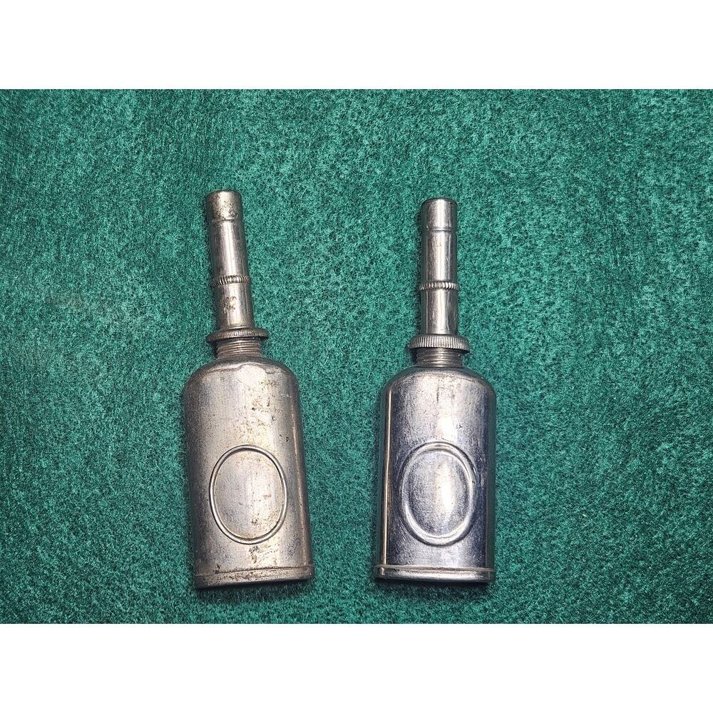Vintage pair of miniature pocket metal Thum press oil can... made in USA. USA.
